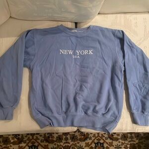 Brandy Melville blue New York crewneck.